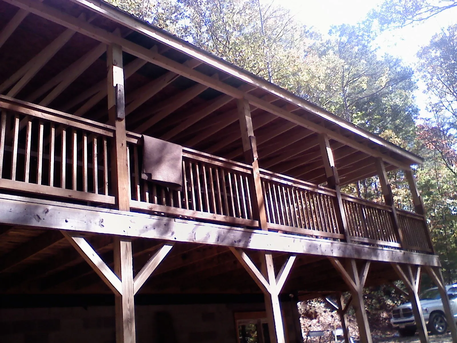 Timber framing under a new elevated porch and deck — Roof Leak Repair in New Milford by Roofing Brothers
